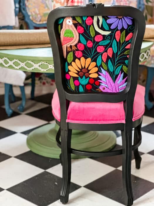 Black-painted chair with large-scale floral print seat and backrest