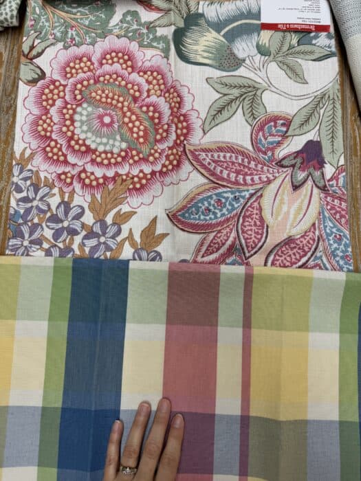 Picture of the floral print with a multicolored plaid fabric.