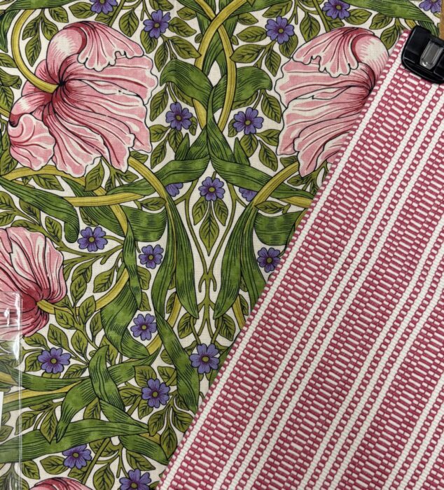 Floral fabric paired with the pink striped fabric.