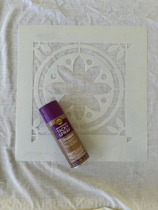 Stencil with the tacky spray.