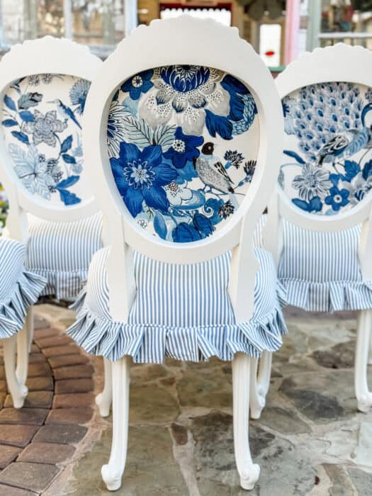 3 dining chairs showing Lansdale Bouquet fabric by Schumacher. 