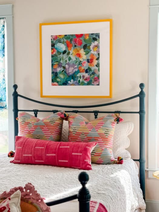 Kim Parker print framed in yellow.