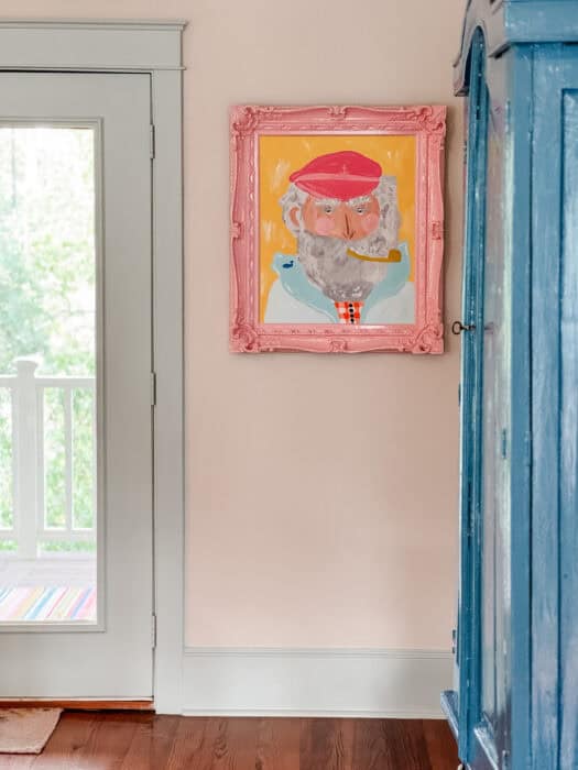 Picture of sailor in a pink frame. 