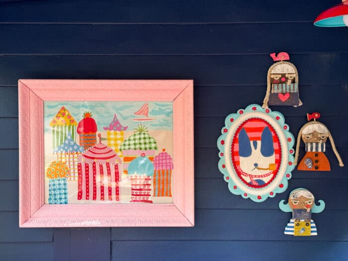 Cabana painting in a pink frame
