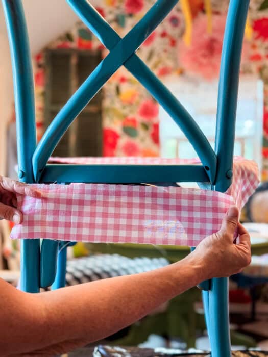 Cut fabric into small scraps to put on chair.